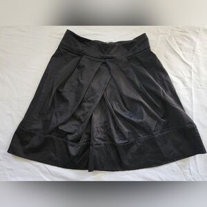 bebe Black Circle Skirt with Front Pleat Detail (sz 4)